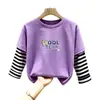 Camiseta de manga larga de algodón puro para niño 2026 primavera y otoño nueva elegante de dibujos animados estilo dos piezas falsas camiseta base de primavera para niño