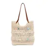 Bolsa de playa tejida hueca con estrella de mar y concha para mujer 2026 Nueva bolsa de hombro de paja de gran capacidad