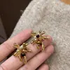 Pendientes de Fuegos Artificiales con Cuentas de Ojo de Tigre Maillard Otoño e Invierno 2026 Pendientes Populares Nuevos Pendientes de Nicho para Mujer