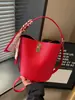 Bolso de comercio exterior para mujer, bolso de cubo de mano retro simple, bolso cruzado de nicho de gran capacidad para el trabajo, bolso de hombro versátil para comercio transfronterizo