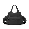 Bolso de Nylon con Múltiples Bolsillos Nuevo 2026 para Mujer, Bolso de Mano Sencillo, Bolso de Hombro de Color Sólido, Bolso Cruzado de Viaje de Gran Capacidad