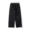 Pantalones casuales de cintura elástica elegantes de verano para hombre, pantalones largos versátiles rectos holgados de pierna ancha con caída, deportivos de moda
