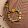 Nuevo brazalete de gato de madera de dibujos animados chinos lindo con cuentas cuerda elástica ajustable brazalete personalizado brazalete ajustable