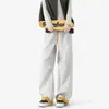 Calça de Softshell à Prova de Três Elementos Dopamine Outdoor com Perna Curva Outono Nova Marca Tendência para Casais Elástica Patchwork Americano Calça Esportiva