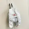 Mochila de Rayas de Gran Capacidad, Moda, Tendencia, Orejas de Conejo Lindas, 2026, Fresca, Moderna, Elegante, Diseño para Viajero