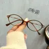 Nuevas monturas de gafas graduadas estilo ojo de gato coreano de Qianai para mujer, aspecto natural, monturas ovaladas de TR90 a la moda, venta al por mayor de gafas en Danyang