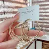 Pendientes de Metal Geométricos de Tres Anillos Estilo Europeo y Americano para Mujer, Nicho de Alto Temperamento, Pendientes de Aguja de Plata de Celebridad de Internet, Pendientes Versátiles