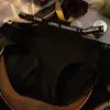 2027 Nuevas Bragas Sexy Europeas y Americanas de Tira Fina Huecas de Seda de Hielo Estampado de Leopardo para Mujer de Cintura Media con Entrepierna de Algodón Puro Tanga para Dama