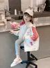 Ropa exterior de otoño para niñas 2026 nueva elegante estilo coreano para niños primavera y otoño con capucha de dibujos animados bloques de color chaqueta top