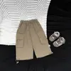 Pantalones cargo casuales versátiles de otoño para bebés niños estilo coreano, nuevos pantalones jogger con cordón y bolsillos grandes para bebés
