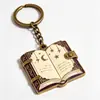 Llavero de metal de dibujos animados personalizado, colgante de llave de cámara esmaltado electrochapado fundido a presión, regalo cultural y creativo, llavero para parejas
