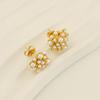 Pendientes de botón de perla estilo Hepburn Sunflower vintage con baño de oro de 18 quilates de acero inoxidable transfronterizos Pendientes de acero de titanio Venta al por mayor