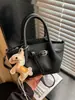 Bolsa Saco de Couro de Alta Qualidade com Padrão de Lichia 2026 Nova Coleção de Primavera Bolsa de Mão e Bolsa Transversal Design de Nicho Fashionável Bolsa Asa