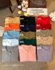 Suéter de punto coreano estilo caramelo para otoño e invierno, cuello redondo, prenda exterior corta, capa interior y top para mujer