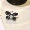 Pendientes de Flor de Papel de Oro Negro 2024 Nuevos Pendientes Pequeños Fragantes Populares Pendientes de Estilo Francés Anillo