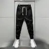 Novas calças casuais masculinas da moda de outono com cós elástico, estilo jogger, modelagem solta, calças de moletom esportivas, vestuário casual masculino