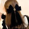 Horquilla de lazo estilo Chanel Hepburn francés pequeño para mujer, clip de resorte para la parte posterior de la cabeza, sentido de celebridad de Internet, clip para otoño e invierno, tocado