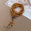 Pulsera de Flores de Madera con Cuentas Color Café Maillard Transfronteriza Europea y Americana Pulsera de Lujo Ligero de Gama Alta Joyería de Mano Versátil Retro