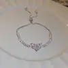 [Cadena de Diamantes Arcoíris] Pulsera de extracción de zircón trenzado en cruz, una pulsera lujosa y de alta gama, una pieza de joyería delicada y de moda