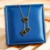 Venta Caliente Cruzada Collar de Acero de Titanio Trébol de Cuatro Hojas Collar con Borla Joyería para Mujeres Temperamento Sencillo Versátil No Se Desvanece