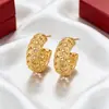 Pendientes Huecos de Lujo Ligero Xuping, Aleación de Cobre Anillo en C, Pendientes Elegantes Personalizados Transfronterizos Europeos y Americanos