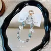 Colgante de cadena para teléfono con cuentas de cristal y campanita, accesorio para la muñeca, cadena corta anti-pérdida para teléfono, accesorio para bolso, pequeño regalo