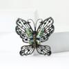 Broche de mariposa hueco con diamantes de imitación de aleación retro con personalidad europea y americana, broche de joyería de ramillete para vestido de dama de temperamento de alta gama