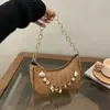 Moda Primavera 2026 Versátil Alta Calidad Elegante Cadena Concha Diseño de Nicho Bolso de Hombro Bolso Cruzado