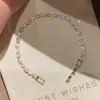 Pulsera de circonita multicolor de lujo ligero para comercio exterior europeo y americano, deslumbrante con incrustaciones de diamantes, a la moda, simple, elegante, joyería de alta gama al por mayor