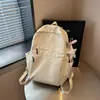 Nova mochila pequena leve estilo Mori moda coreana versátil estilosa para mulheres nicho cor sólida retrô alto valor bolsa de ombro dupla