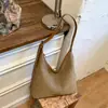 Bolso de hombro tejido elegante y a la moda de Shuai Mi, bolso tote vintage de gran capacidad, bolso único ligero de gran capacidad para debajo del brazo