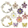 Colgante de Mariposa Hueca Flor de Amor Margarita Flor de Cerezo Joyería Accesorios DIY Collar de Flores Pulsera Accesorios para Mujer Colgante Venta al por Mayor
