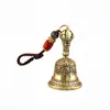 Popular campana de latón estilo Tíbet con monedas de los Cinco Emperadores, campana de la paz, accesorio antiguo creativo, campana de mano Vajra, venta al por mayor