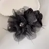 Anillo para el pelo de flor de tela estilo coreano con pluma, anillo para el pelo de volumen para la parte trasera de la cabeza, estilo extranjero de alto nivel, flor de escamas hecha a mano, accesorios para el pelo