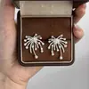 Pendientes de Zirconia y Perla con Diseño de Fuegos Artificiales de Lujo Ligero para Mujer, Pendientes de Diseño de Nicho de Alta Gama, Pendientes de Moda y Elegantes, Estilo Nuevo