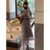 Falda de pastel estilo tweed Traje de moda 2025 Nuevo de verano Vestido de verano Estilo caliente de alta gama Dos piezas que reducen la edad Traje de mujer