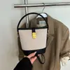 Bolso de Lona de Nicho Transfronterizo para Mujer 2026 Nuevo Estilo Primavera Bolso de Mano Versátil de Gama Alta Bolso Cubo Bolso de Hombro Único Bolso Cruzado