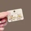 Jeans Ojo de Gato Flor Pequeña Cintura Ajustada Artefacto Cintura sin Costuras Gran Cambio Pantalones Falda Pequeños Hebilla de Cintura Ajustable Elástica