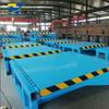 Contenedor de suministro almacenamiento logística ajuste eléctrico de altura acero al manganeso hidráulico fijo plataforma de carga y descarga puente de embarque