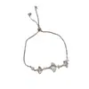 Design de moda nicho de luxo leve senso de design pedra olho de gato prateada folha de ginkgo pulseira feminina requintada super brilhante joias atacado