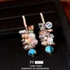 Brincos de prata com agulha europeus e americanos transfronteiriços com diamantes e zircônia, brincos de franja, brincos de nicho de alta qualidade, acessórios versáteis para vestidos de noite para mulheres