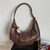 Bolso de Axila de Textura Popular Versátil Retro de Nicho para Mujer Verano 2025 Bolso de Hombro Cruzado Casual Simple