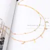 Europa y Estados Unidos transfronterizo simple doble luna estrella collar corto cadena de cuentas redondas clavícula collar fabricantes al por mayor