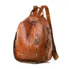 Outono de 2026 Nova Mochila Vintage de Couro Macio Grande Capacidade Multiuso Feminina Moda Viagem Escola Atacado