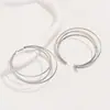 Europa y Estados Unidos suministro transfronterizo de exagerados pendientes de moda de aro grande para rostro fino de mujer pendientes dorados simples multicapa retro