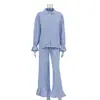 Traje casual de moda a cuadros para mujer 2025 nuevo conjunto de dos piezas con solapa, manga de cuerno, camisa y pantalones con volantes