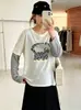 Suéter de punto a rayas con estampado de gatito de dibujos animados para mujer de talla grande, estilo otoño 2026 para mujeres de talla grande, top casual de imitación de dos piezas
