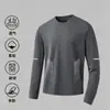 Temporada de primavera y otoño, camiseta lisa popular de manga larga, corte holgado, cuello redondo, unisex, top simple y versátil