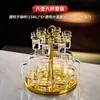 Nuevo juego dispensador de copas de licor de vidrio de lujo de alta gama para uso doméstico, copa tipo bala creativa con pan de oro, utensilios de vino de un solo trago