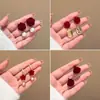 Pendientes rojos de Año Nuevo para mujer, otoño e invierno, con lazo, con clip para las orejas, nuevos pendientes de perla de Año Nuevo 2024